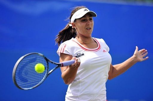 Austria&#039;s Tamira Paszek hits a shot during her semi-final match at the AEGON International in Eastbourne