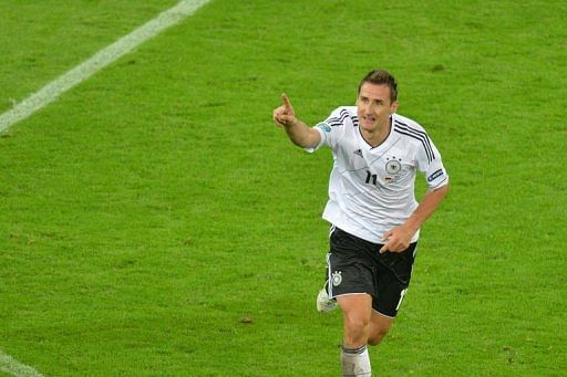 German forward Miroslav Klose celebrates after scoring