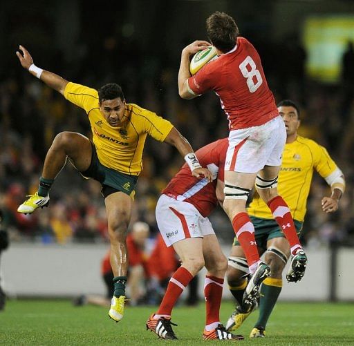Ryan Jones (R) of Wales marks the ball during their second Rugby Union Test match against Australia