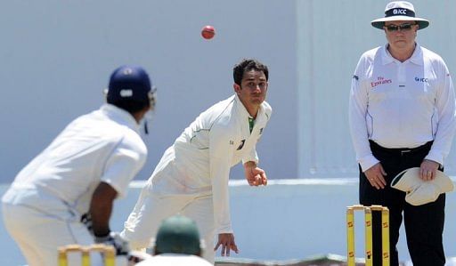 Pakistan&#039;s Saeed Ajmal (C) was the world&#039;s leading Test wicket-taker in 2011 with 50 scalps in eight matches