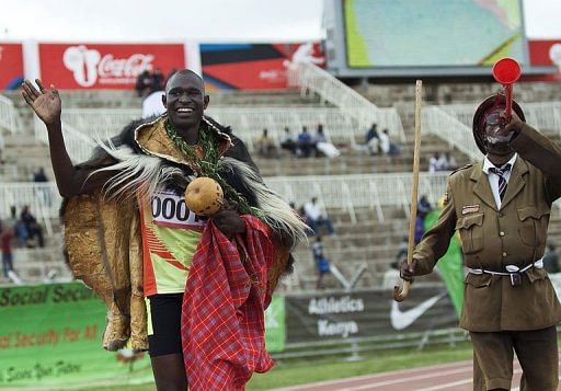 Men&#039;s 800m world record holder, David Rudisha (L) of Kenya celebrates after winning a race