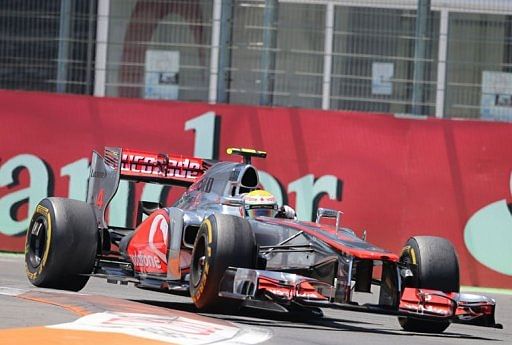 McLaren Mercedes&#039; British driver Lewis Hamilton drives at the Valencia Street Circuit