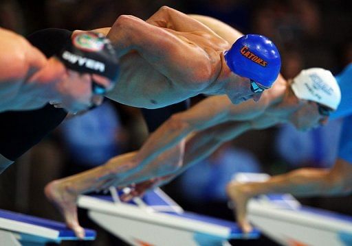 Ryan Lochte edged Michael Phelps by two-hundredths of a second in the semi-finals of the 200m free