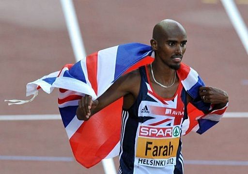 Mo Farah celebrates winning the men&#039;s 5000m final