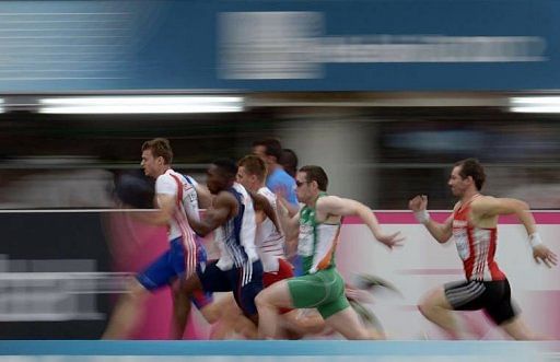 France&#039;s Christophe Lemaitre (L) leads the men&#039;s 100m qualifications