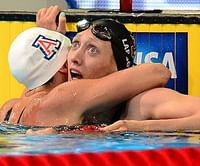 Phelps edges Lochte, Franklin denies Coughlin
