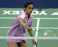 Saina books quarterfinal spot; Sindhu falters