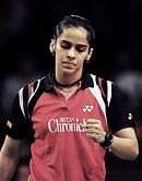 Saina wins epic contest to enter semifinals