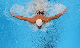 Phelps tops 100m fly times, Lochte duel looms