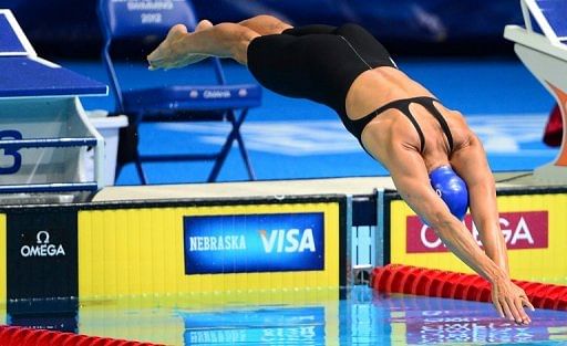 Dara Torres, 45, dives to start her race in Heat 16