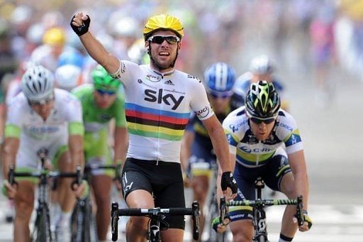 Britain&#039;s Mark Cavendish celebrates on the finish line in Tournai, southern Belgium