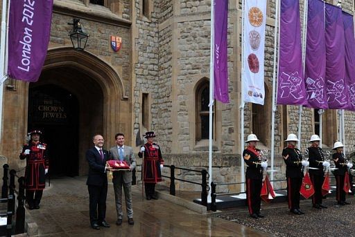 Seb Coe (R) and Rio Tinto Chairman Jan du Plessis pose at the Tower of London