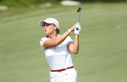 Cristie Kerr hits her second shot on the par 4 14th hole during round one