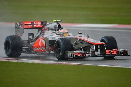 McLaren Mercedes&#039; British driver Lewis Hamilton drives