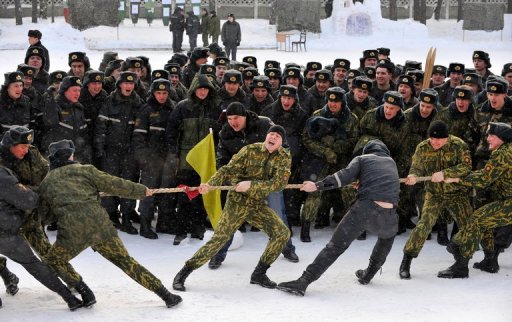 Belarusian troops carry out a traditional tug of war in February -- but won&#039;t be taking their skills to the Olympics