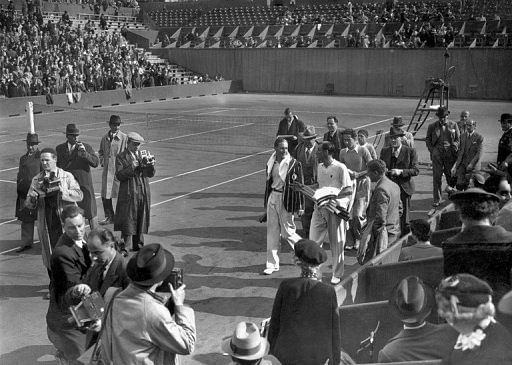 Von Cramm (left) and Perry at the French Open in 1936