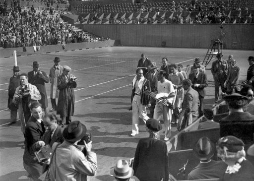 Von Cramm (left) and Perry at the French Open in 1936