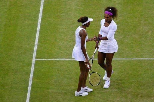 Americans Serena (R) and Venus Williams