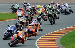 Pedrosa makes it three in MotoGP, Stoner crashes out