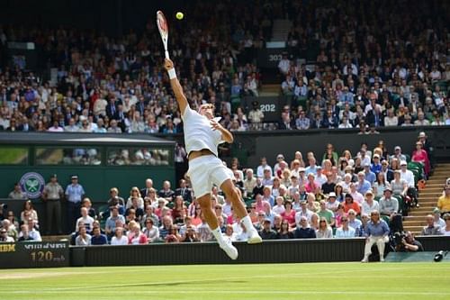 Switzerland's Roger Federer jumps to play a shot