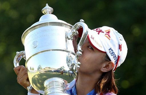 Na Yeon Choi of South Korea kisses the championship trophy