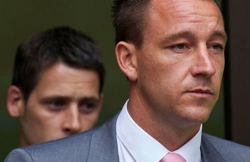 John Terry (R) leaves Westminster Magistrates' Court in central London on Monday John Terry (R) leaves Westminster Magistrates' Court in central London on Monday