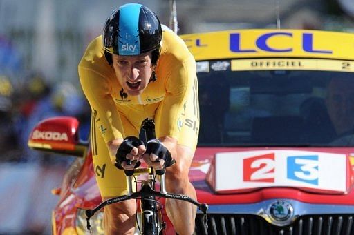 Britain&#039;s Bradley Wiggins, wearing the overall leader&#039;s yellow jersey, at the end of the Tour de France Stage 9