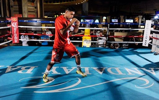 Boxer Amir Khan shadow boxes during a public workout session at the Mandalay Bay Resort &amp; Casino