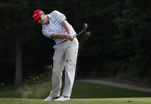 Troy Matteson hits his second shot on the eighth hole during the first round