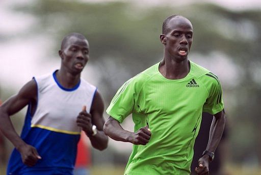 Brimin Kipruto (right) goes through the paces 2012 with compatriot African champion Abel Mutai