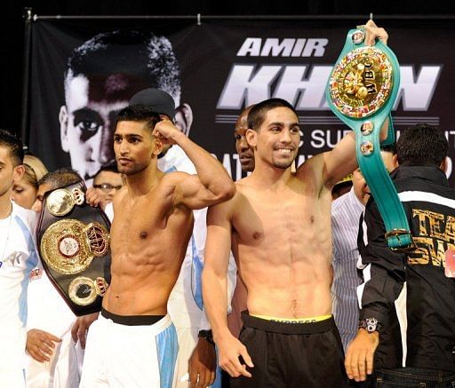 Amir Khan (L) will defend the WBA title he was given earlier this week while Danny Garcia defends his WBC crown