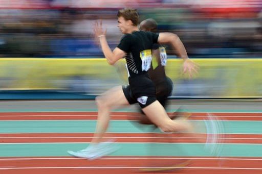 France&#039;s Christophe Lemaitre races alongside Netherlands&#039; Churandy Martina in the men&#039;s 200m final