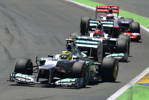 Mercedes&#039; German drivers Nico Rosberg andMichael Schumacher and McLaren Mercedes&#039; British driver Lewis Hamilton on track