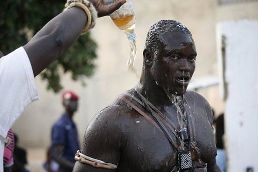 From remote villages to stadiums teeming with thousands of fans, traditional wrestling is Senegal&#039;s sport of choice