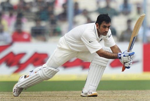 Mahendra Singh Dhoni plays a shot during a Test match against West Indies at the Eden Gardens in Kolkata