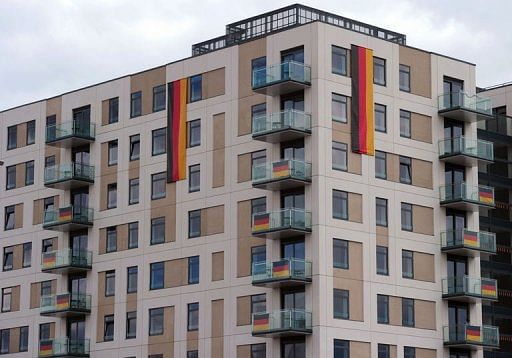Flags are pictured on the balconies of the German Olympic team accommodation