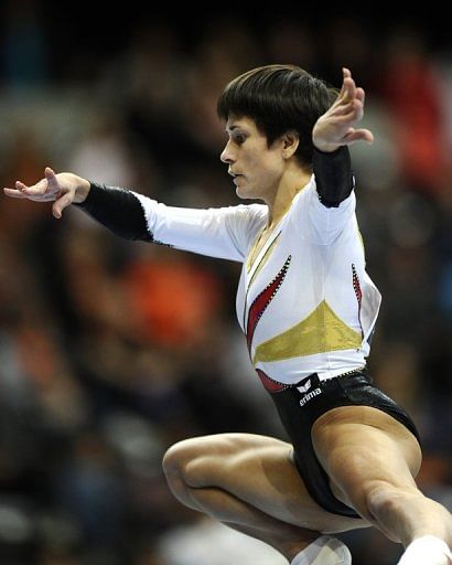 Germany&#039;s Oksana Chusovitina performs her routine on the balance beam in Rotterdam in 2010