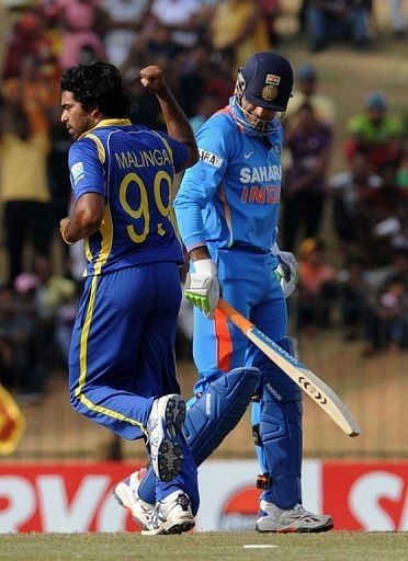 Sri Lankan bowler Lasith Malinga celebrates the dismissal of Indian batsman Irfan Pathan in Hambantota