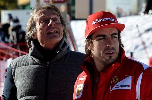 Luca Cordero di Montezemolo (left) chats with F1 driver Spanish Fernando Alonso