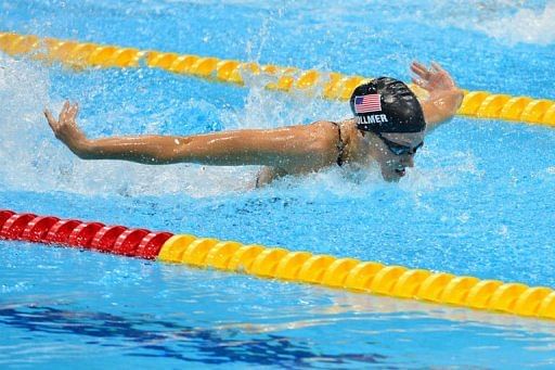 US swimmer Dana Vollmer competes in the women&#039;s 100m butterfly final