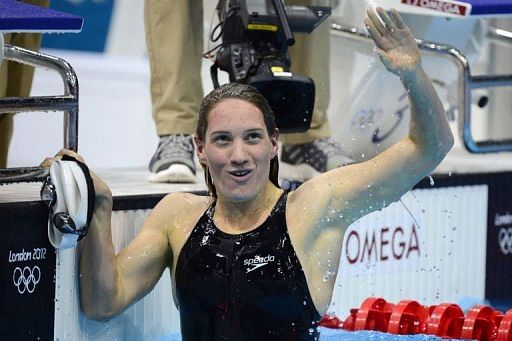 France&#039;s Camille Muffat celebrates after the women&#039;s 400m freestyle final
