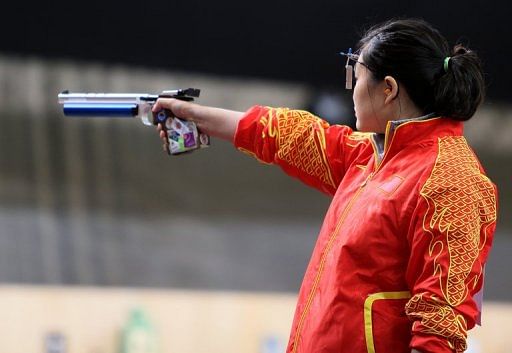 Gold medalist Chinese Guo Wenjun competes in the women&#039;s 10m air pistol event