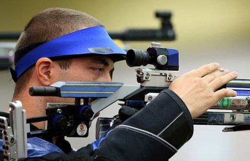 Alin Moldoveanu takes aim during the competition on Monday