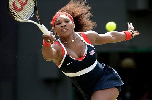 US Serena Williams returns the ball to Poland&#039;s Urszula Radwanska