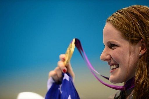 Missy Franklin of the US celebrates with her gold medal