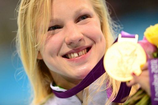 Lithuania&#039;s Ruta Meilutyte poses with her gold medal