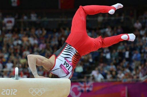 Japan&#039;s gymnast Kohei Uchimura competes on the pommel horse