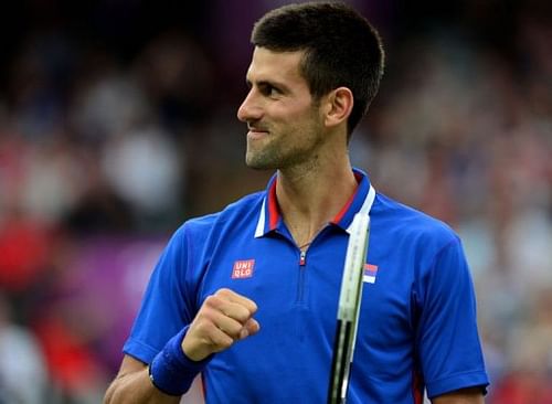 Serbia's Novak Djokovic celebrates victory over Andy Roddick of the US