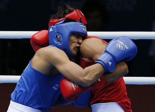 Serdar Hudayberdiyev (R) of Turkmenistan and Manoj Kumar (L) of India