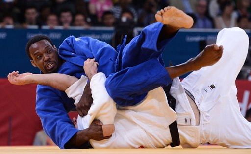 Alexandre Emond (white) competes with Winston Gordon